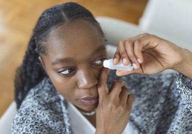 Woman using eye drop, woman dropping eye lubricant to treat dry eye or allergy, sick woman treating eyeball irritation or inflammation woman suffering from irritated eye, optical symptoms